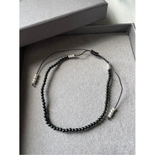 Load image into Gallery viewer,  sophisticated Gaia PureKtchn London Black Agate Bracelet with grounding black Agate stones, paired with pearls and sterling silver. Designed to shield against negativity and provide emotional stability, this bracelet is a bold yet elegant accessory.
