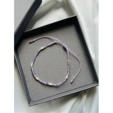 Load image into Gallery viewer, A stunning Gaia PureKtchn London Amethyst Bracelet crafted with deep purple Amethyst beads, delicate pearls, and shimmering sterling silver. Known for its balancing and protective properties, this bracelet inspires well-being and emotional clarity.
