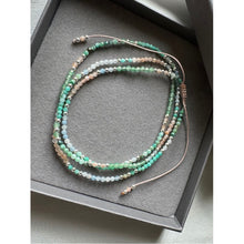 Load image into Gallery viewer, The Gaia PureKtchn London Harmony Bracelet showcases a calming blend of Amazonite, Aquamarine, Sunstone, Emerald Jade, and Phoenix Pine gemstones. This elegant piece is designed to bring calm, clarity, and positivity, paired with pearls and sterling silver for a timeless look.
